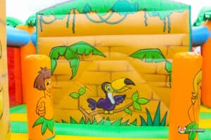 Brightly coloured cartoon artwork of birds and greenery.