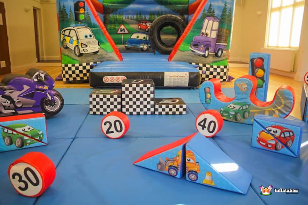 Bright Automobile themed bouncy castle and soft play shapes.