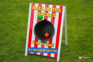 A vibrant ball placed in a bucket, capturing a moment of joy and playfulness.