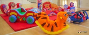 Circus-themed soft play area featuring various colorful toys for children to enjoy and explore.