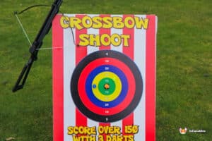 Sign reading "Crossbow Shootout" indicating the location of a crossbow shooting event.