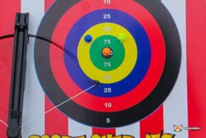 A sign labeled "Crossbow Shootout," indicating where the crossbow shooting activity takes place.