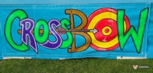 Colorful banner featuring the word "CrossBow" with an arrow hitting a bullseye target design on a bright blue background.