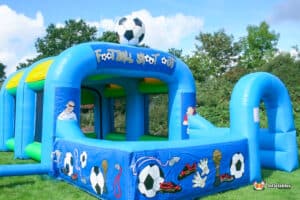 Inflatable soccer field featuring a soccer ball and radar setup for the Football Speed Radar Shootout event.