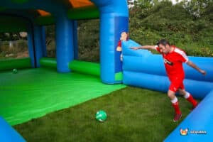 Soccer ball on an inflatable field, part of the Football Speed Radar Shootout event for measuring kick speed.
