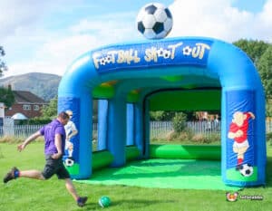 A large inflatable with football theme for testing the speed of a kick..