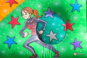 A colorful inflatable bounce house features a cartoon character in motion, surrounded by vibrant stars against a green background.