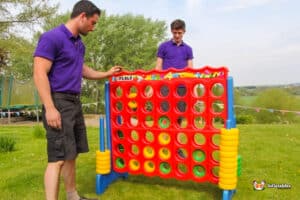 Two men playing a game in the garden