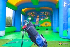 A large inflatable arena for the use of the chipping challenge using Golf Clubs.