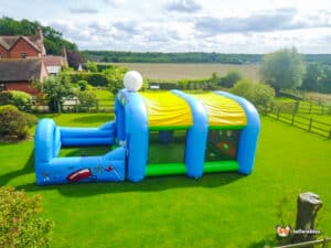 Large inflatable Arena with a golf chipping challenge, inviting players to aim for the hole-in-one target.