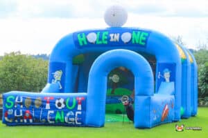 A large inflatable bouncer featuring a fun golf chipping challenge with a hole-in-one target.