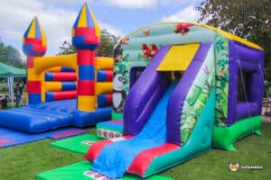 Jungle bouncy castle with slide for children's parties.