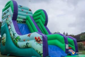 green and blue giant slide inflatable for events
