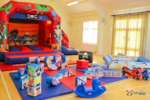 Vibrant pirate themed bouncy castle soft play shapes with fun pirate art work.