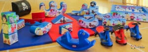 A playful pirate-themed area with soft toys and climbing structures, perfect for children's adventures and exploration.