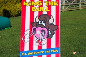 A colourful sign that reads encouraging people to engage with the activity.