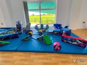 A cheerful play area at Sea Life Soft Play, featuring a variety of toys for kids to explore and play with.