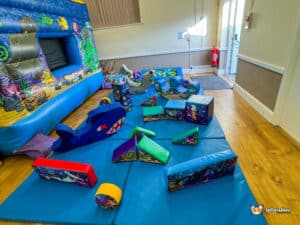Colorful under the sea themed soft play area with ocean creatures and vibrant decorations for children to enjoy.