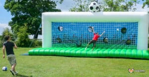 Colorful inflatable soccer goal designed for penalty shootouts, perfect for outdoor games and family fun.