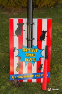 Red and white striped sign featuring a cartoon mouse, l