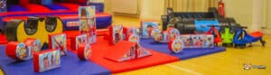 Cheerful play space showcasing toys and a car, encouraging imaginative play at Superhero Soft Play.