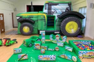 Inflatables tractor and various soft play toys, part of the Tractor Bounce & Slide Soft Play Package.
