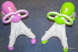 A colorful walk-and-ride toy, both designed for infants to play and explore.