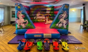 Badsey Community & Sports Club Unicorn bouncer with plasma cars