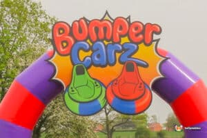 A vibrant sign reading "Bumper Carz," featuring playful typography and a fun design.