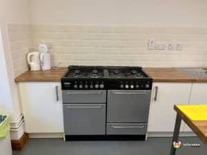 Double oven inside kitchen.