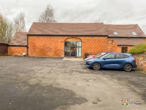 Gravel drive and entrance.