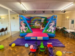 Rushwick Village hall BBC inflatables Unicorn bouncer and plasma cars