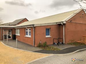 Hartlebury outside the building.