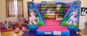 pink unicorn castle , low bouncer