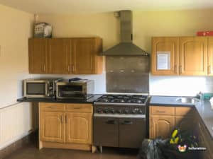 Kitchen equipment, oven , microwave and worktops.