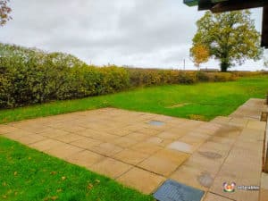 Rock Village Hall with Patio and Grass Area