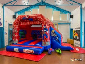 Hero bounce and slide with ride on cars.