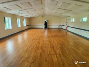empty hall with hardwood flooring