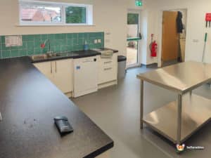 Kitchen dishwasher and worktops.
