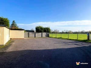 driveway leading to field.