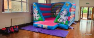 Girls Bouncy castle with unicorn theme