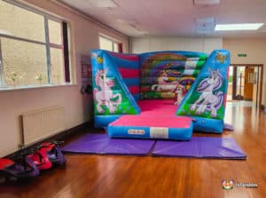 Bouncy castle with Unicorn artwork.