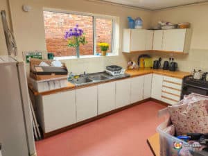 Kitchen units, sinks and utensils.