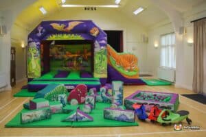 A vibrant bouncy castle and a variety of toys for kids to explore and enjoy.