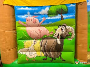 Cute farm themed bouncy castle ideal for birthday parties.