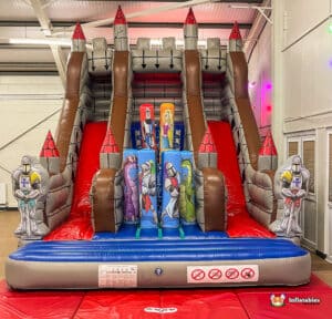 A colorful castle slide featuring the top, inviting children to play and slide down.