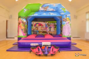 A cheerful bouncy castle with princess illustrations, called "Princess Bouncer," offering a fun play area for kids.