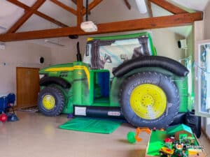 Broom Village Hall Farm themed party with tractor Bouncy castle